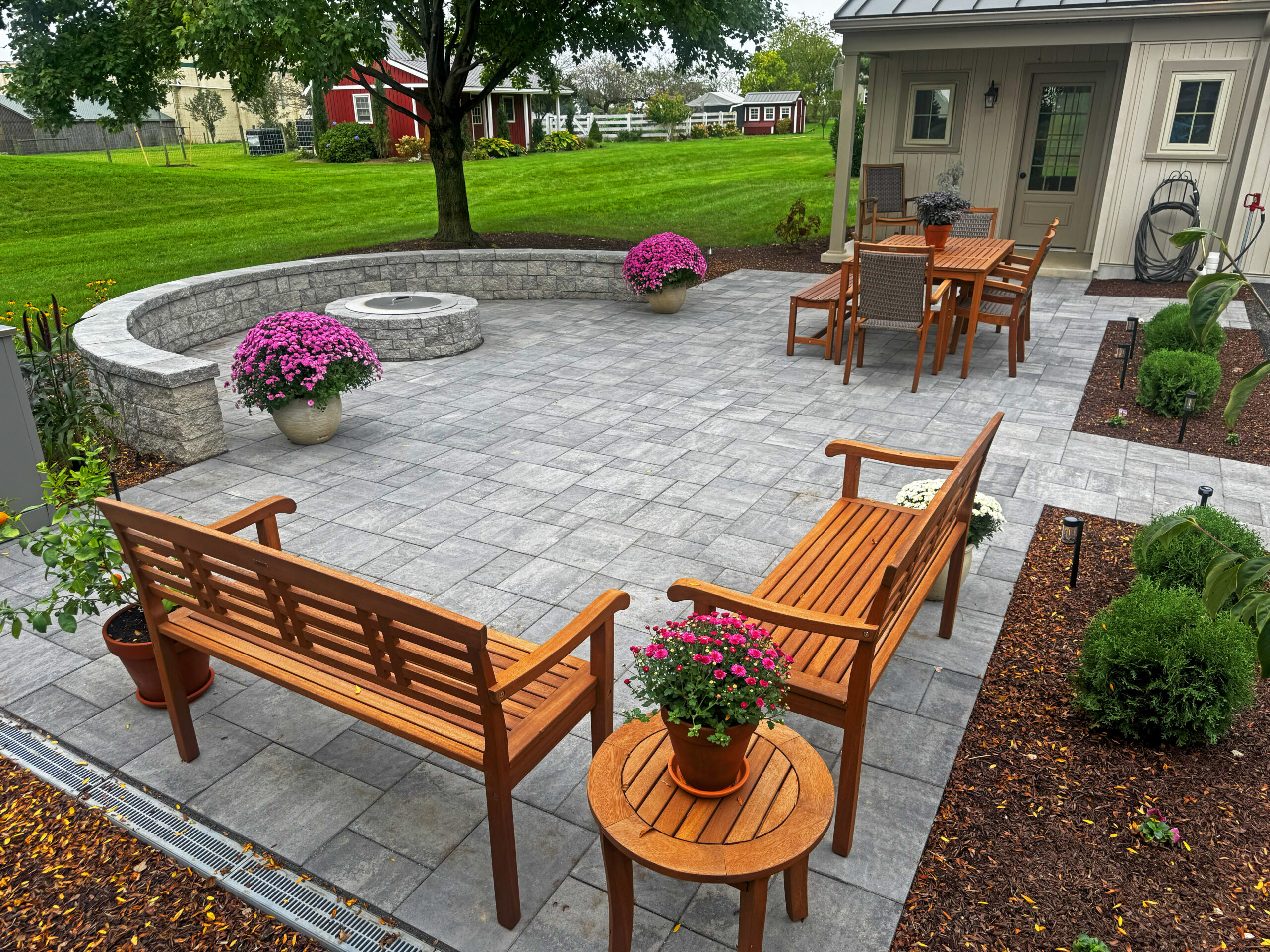 Paver Patio, Outdoor Kitchen, fire pit, seating wall, landscaping