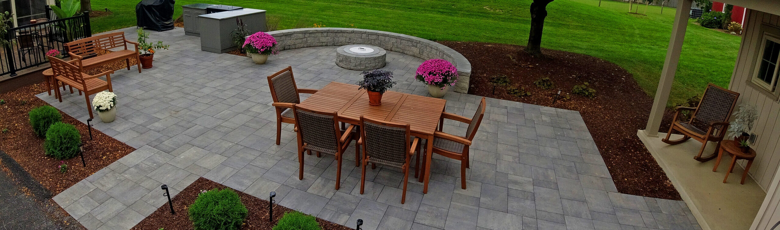 Paver Patio, Outdoor Kitchen, fire pit, seating wall, landscaping
