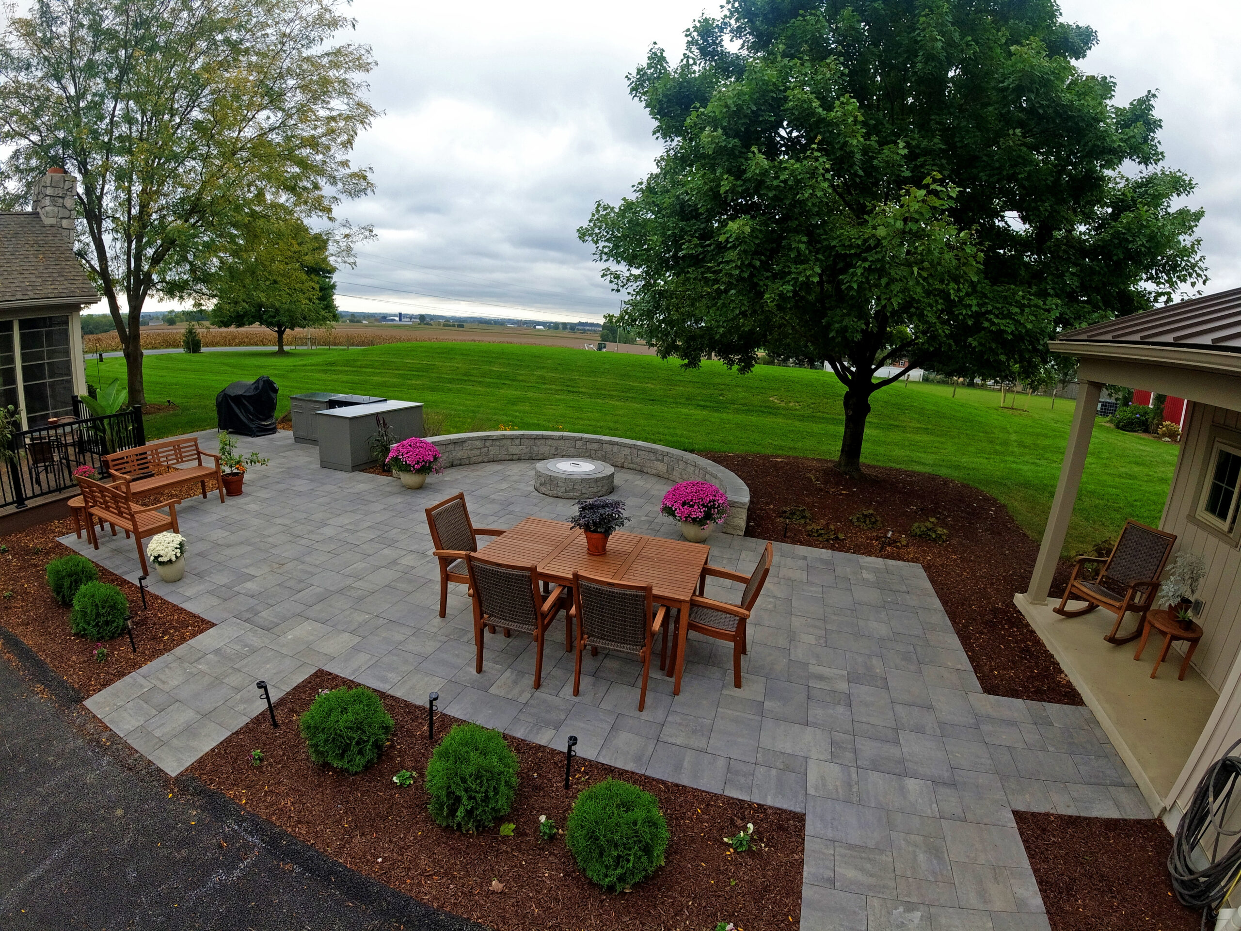 Paver Patio, Outdoor Kitchen, fire pit, seating wall, landscaping