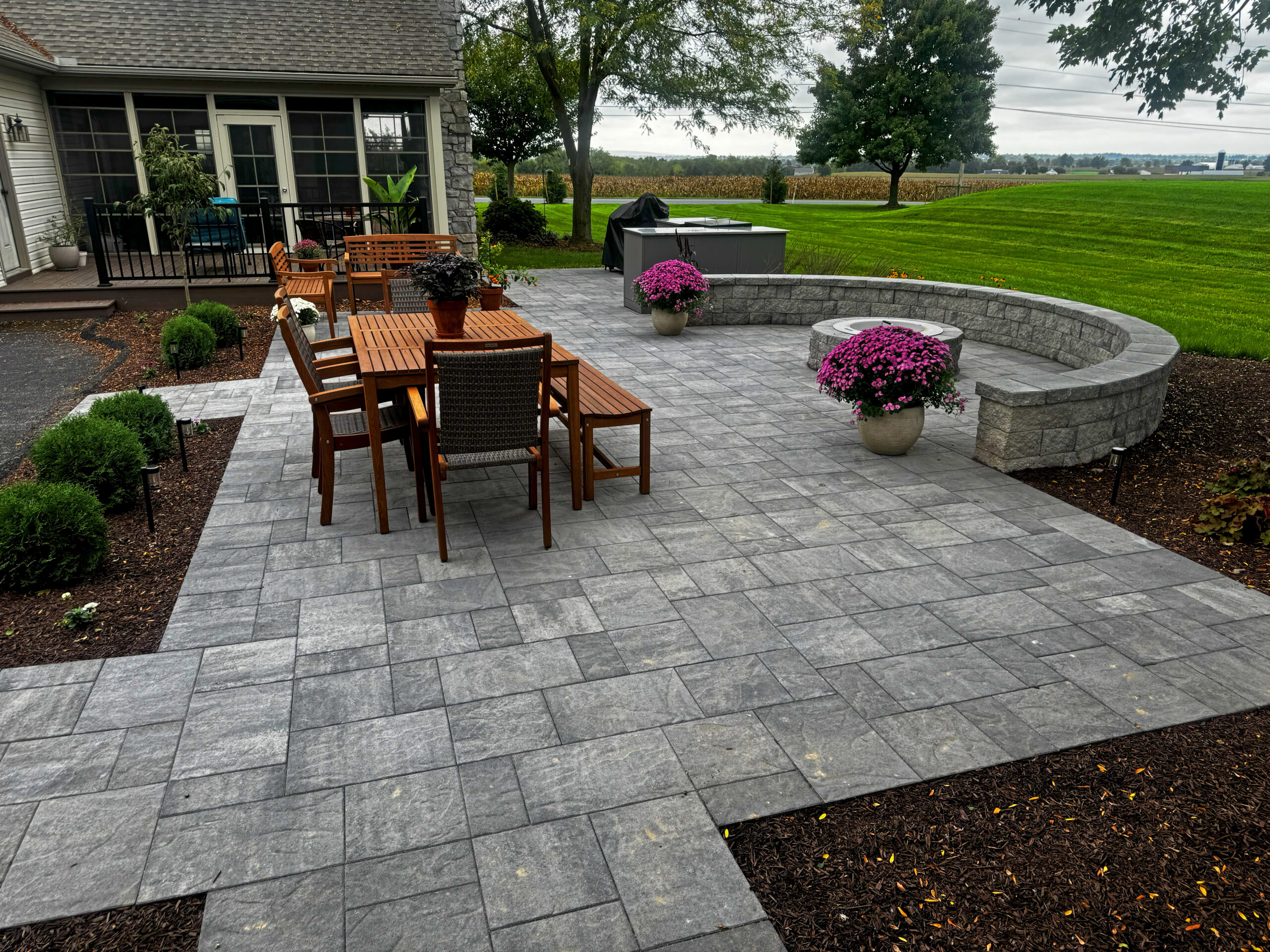 Paver Patio, Outdoor Kitchen, fire pit, seating wall, landscaping