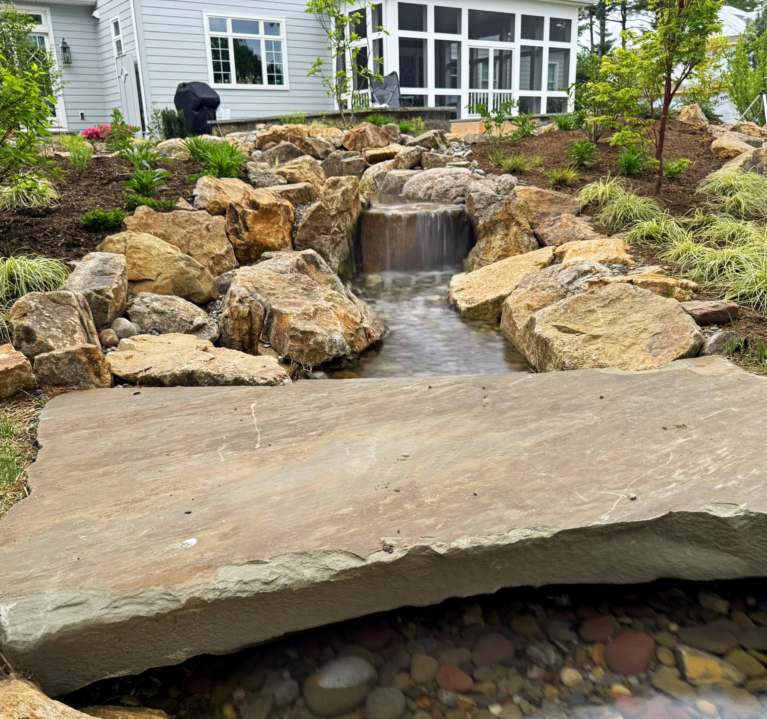 Mini Natural Swimming Pond with Stream and Waterfalls and natural stone bridge